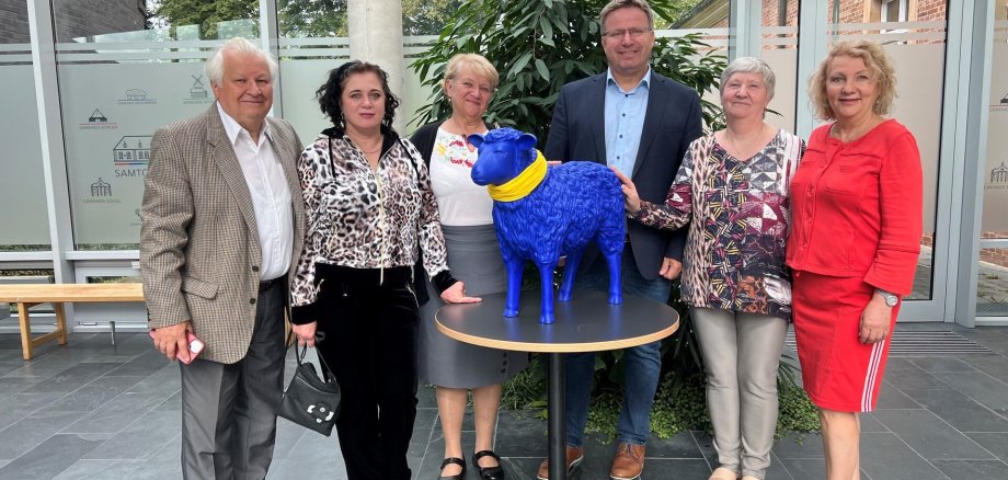 Ein Bild mit fünf Personen