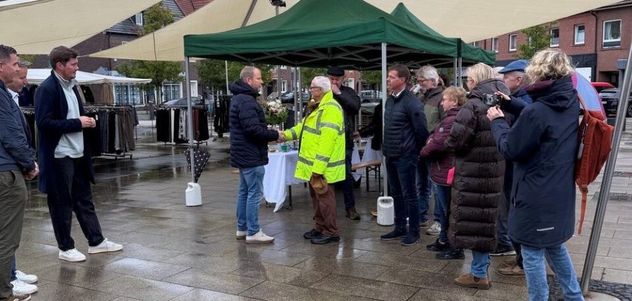 Ein Foto von mit einer Gruppe von Personen